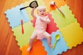 Baby girl with kitchen utensils Royalty Free Stock Photo