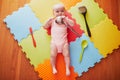 Baby girl with kitchen utensils Royalty Free Stock Photo