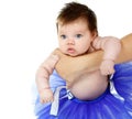 baby girl like a ballet dancer in blue tutu, cute infant over white