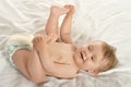 Baby girl lying in pampers Royalty Free Stock Photo