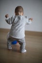 Baby learning how to walk Royalty Free Stock Photo