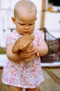 Baby girl with mushroom Royalty Free Stock Photo