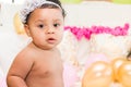 Baby Girl With Pillows and Balloons