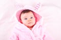 Baby girl in pink bathrobe. Royalty Free Stock Photo