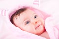 Baby girl in pink bathrobe. Royalty Free Stock Photo