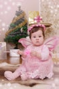 Baby girl with pink butterfly wings Royalty Free Stock Photo