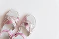 Baby girl pink sandals isolated on background. Baby fashion pair pink sandals shoes for the toddlers feet Royalty Free Stock Photo