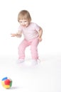 Baby girl is playing with ball Royalty Free Stock Photo