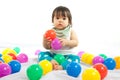 Baby girl is playing ball Royalty Free Stock Photo