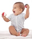 Baby girl playing with balls. Royalty Free Stock Photo