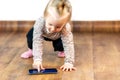 Baby girl playing game on smarthphone