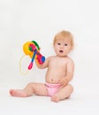 Baby girl playing music toy Royalty Free Stock Photo