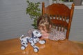 Baby girl playing robot dog video without processing