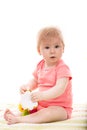 Baby girl playing with toy Royalty Free Stock Photo