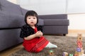 Baby girl playing wooden blocks Royalty Free Stock Photo