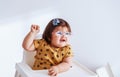 Baby girl with poor eyesight.child with glasses.Cute girl wearing glasses playing happily