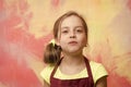 Baby girl posing with mouth full of food Royalty Free Stock Photo