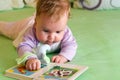 Baby girl reading Royalty Free Stock Photo