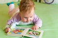 Baby girl reading book Royalty Free Stock Photo