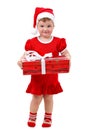 Baby girl in Santa hat holding Christmas present Royalty Free Stock Photo