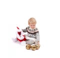 Baby girl and Santa`s hat with christmas ornament Royalty Free Stock Photo