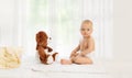 Cute baby playing with teddy bear Royalty Free Stock Photo