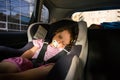 Baby girl sleeping in the car Royalty Free Stock Photo