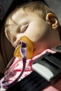 Baby girl sleeping in the car seat Royalty Free Stock Photo
