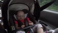 Baby Girl Sleeping in Child Car Seat. Royalty Free Stock Photo