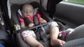 Baby Girl Sleeping in Child Car Seat. Royalty Free Stock Photo