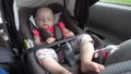 Baby Girl Sleeping in Child Car Seat. Royalty Free Stock Photo