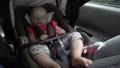 Baby Girl Sleeping in Child Car Seat. Royalty Free Stock Photo