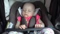 Baby Girl Sleeping in Child Car Seat. Royalty Free Stock Photo