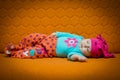 Baby girl sleeping on a couch Royalty Free Stock Photo