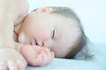 Baby girl sleeping quite, infant cute sleep day time, healthy lifestyle for children Royalty Free Stock Photo