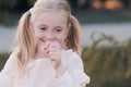 Baby girl smelling flower Royalty Free Stock Photo