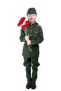 Baby girl standing in uniform with red flowers, on white background