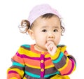 Baby girl suck finger into mouth Royalty Free Stock Photo