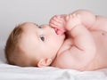 Baby girl sucking her toe Royalty Free Stock Photo