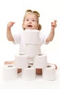 Baby girl with toilet paper Royalty Free Stock Photo
