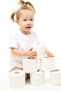 Baby girl with toilet paper Royalty Free Stock Photo