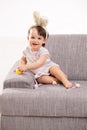 Baby girl with toy chicken and eggs Royalty Free Stock Photo