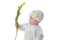 Baby girl with tulip Royalty Free Stock Photo