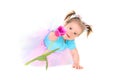 Baby girl in a tutu holding hands tulip Royalty Free Stock Photo