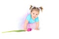 Baby girl in a tutu holding hands tulip Royalty Free Stock Photo