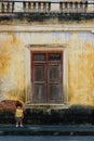 Baby girl on vintage wall