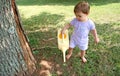 Baby Girl Watering Lawn