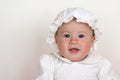 Baby girl wearing christening dress