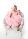 Baby girl wearing pettiskirt tutu and pearls Royalty Free Stock Photo