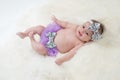 Baby Girl Wearing Purple Bloomers